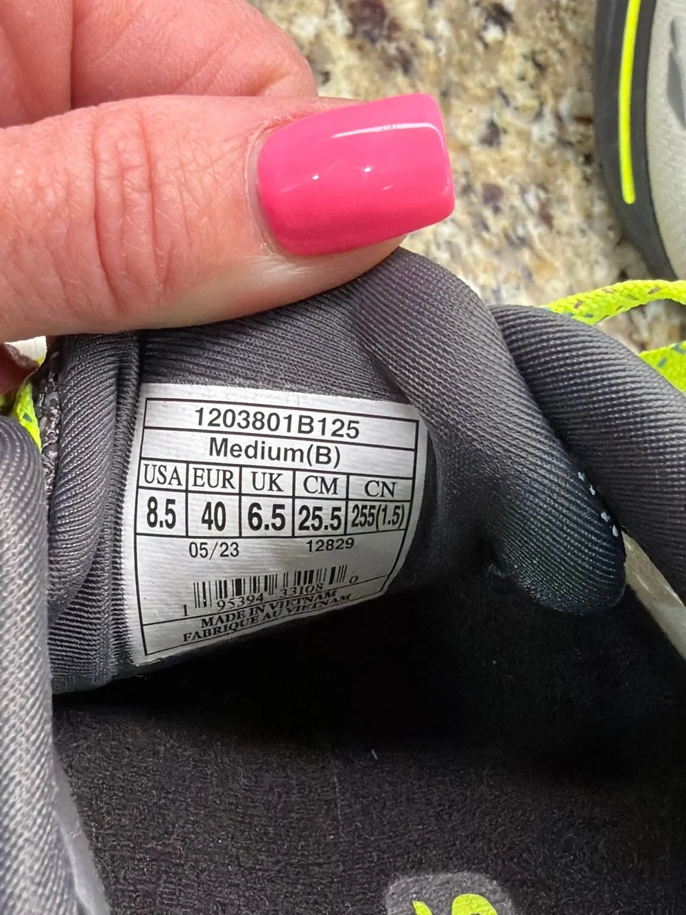 Brooks gray running shoes with neon yellow accents - Picture 2 of 6
